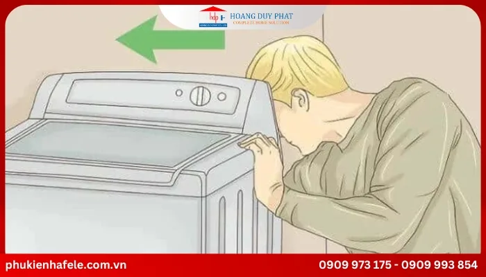 Di chuyển máy giặt để dễ sửa van xả nước máy giặt